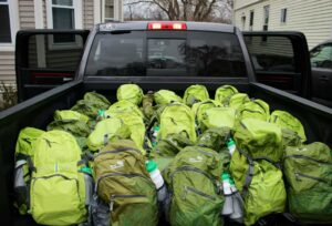 Packed Backpacks in Truck Bed